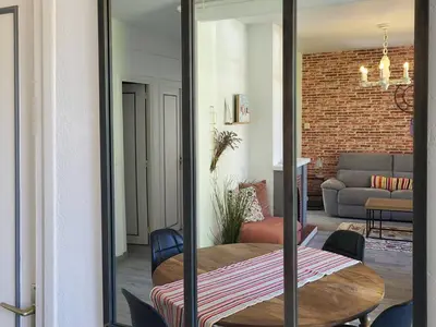Coin salon dans l'établissement Maison confort, 3 chambres, plage à 2 pas, jardin privé sans vis-à-vis, équipements modernes. - FR-1-788-12