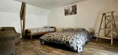 Un ou plusieurs lits dans un hébergement de l'établissement Maison Saint Côme du Mont