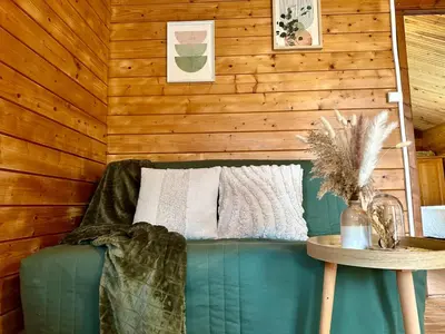 Coin salon dans l'établissement Chalet de la Prairie - Terrain privé - Bain Nordique