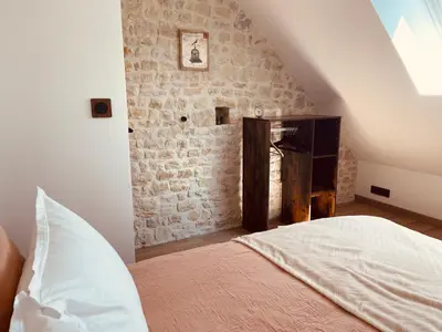 Un ou plusieurs lits dans un hébergement de l'établissement Gîte chez René