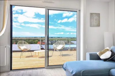 Balcon ou terrasse dans l'établissement Les Euphorbes - Charmante maison avec vue mer