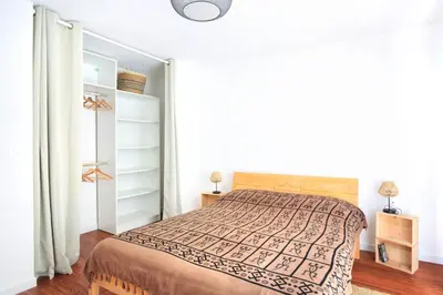 Un ou plusieurs lits dans un hébergement de l'établissement Les Euphorbes - Charmante maison avec vue mer