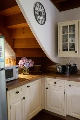 Cuisine ou kitchenette dans l'établissement Croix Rompue