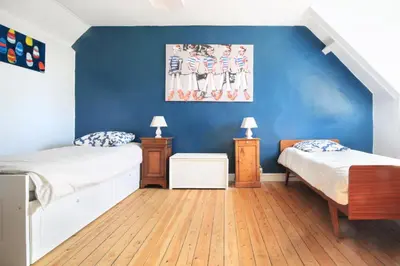 Un ou plusieurs lits dans un hébergement de l'établissement Le Cottage des Pêcheurs - Charmante Maison pour 6