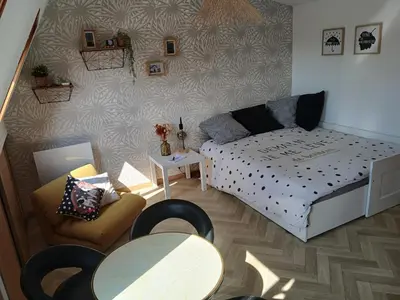 Un ou plusieurs lits dans un hébergement de l'établissement Studio neuf et équipé bord de mer