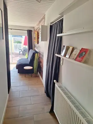 Un ou plusieurs lits dans un hébergement de l'établissement Maisonnette îlot vacances