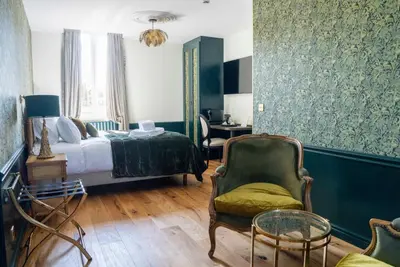 Un ou plusieurs lits dans un hébergement de l'établissement Villa Victoria Hôtel et Spa