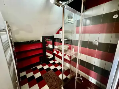 Salle de bains dans l'établissement La Clef Decamp Moulin du Gast 35pers jacuzzi sauna billard baby
