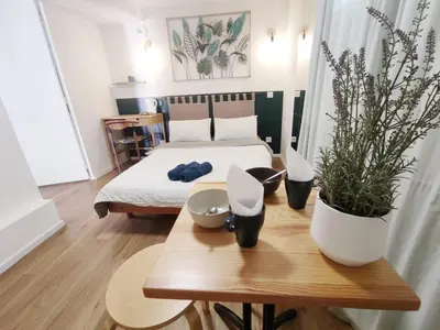 Un ou plusieurs lits dans un hébergement de l'établissement Suite parentale indépendante en ville - chez l'habitant