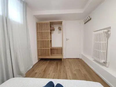 Un ou plusieurs lits dans un hébergement de l'établissement Suite parentale indépendante en ville - chez l'habitant