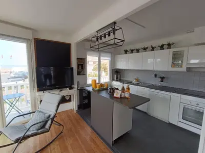 Cuisine ou kitchenette dans l'établissement Grand Bleu de Courseulles