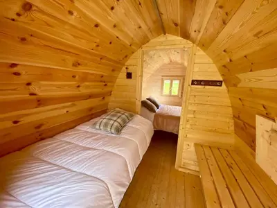 Un ou plusieurs lits dans un hébergement de l'établissement La Clef Decamp Auberge St Vincent et Diligence 35pers jacuzzi, salle de jeux