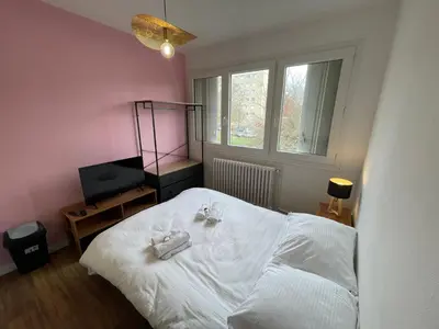 Un ou plusieurs lits dans un hébergement de l'établissement Roza, Studio proche centre ville
