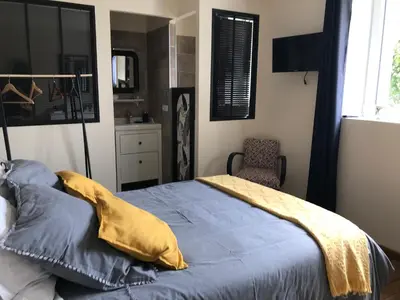 Un ou plusieurs lits dans un hébergement de l'établissement Chambres d'hôtes de la baie