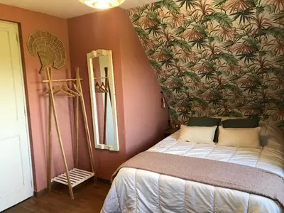 Un ou plusieurs lits dans un hébergement de l'établissement Chambres d'hôtes de la baie
