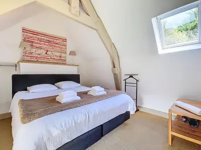 Un ou plusieurs lits dans un hébergement de l'établissement Belle maison de famille