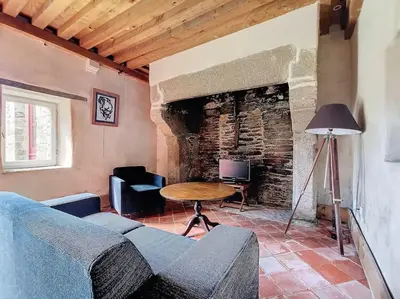 Coin salon dans l'établissement Belle maison de famille