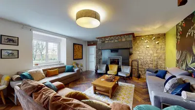 Coin salon dans l'établissement La Clef Decamp Cornillières Maisonnettes 35 pers jacuzzi, jeux