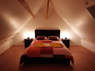 Un ou plusieurs lits dans un hébergement de l'établissement Duplex avec vue sur mer-La Rose des Vents