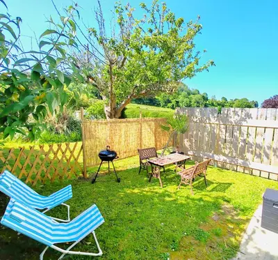 Jardin de l'établissement Maison des Palmiers - Bord de mer et campagne