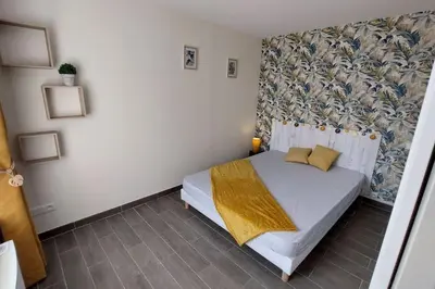 Un ou plusieurs lits dans un hébergement de l'établissement Maison entre terre & mer