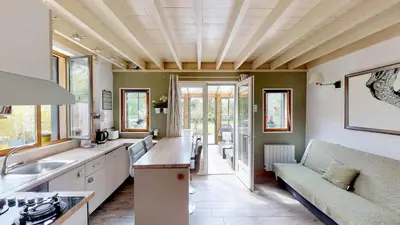 Cuisine ou kitchenette dans l'établissement La Clef Decamp Duckerie 55 pers 5 Gîtes jacuzzi, 15min Mer
