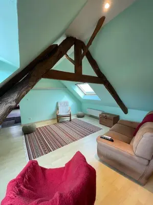 Coin salon dans l'établissement Maison de campagne à la mer