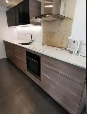 Cuisine ou kitchenette dans l'établissement Appartement charmant et élégant de centre ville