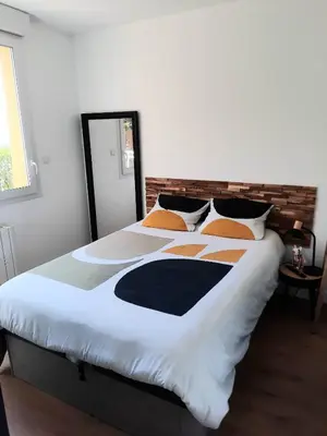 Un ou plusieurs lits dans un hébergement de l'établissement Appartement 2-3 personnes résidence les mimosas Port-Mer Cancale