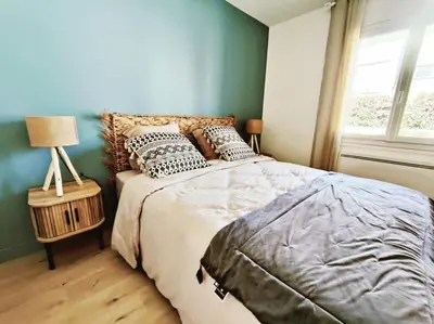 Un ou plusieurs lits dans un hébergement de l'établissement Les Embruns Charmante maison A 50m de la plage