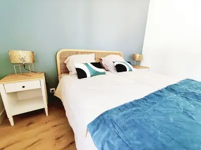 Un ou plusieurs lits dans un hébergement de l'établissement Les Embruns Charmante maison A 50m de la plage