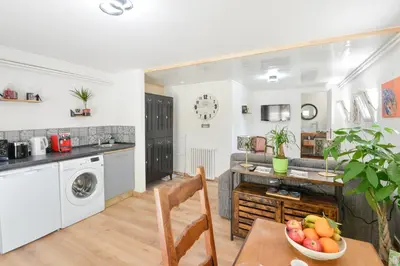 Cuisine ou kitchenette dans l'établissement L'Escapade de Creully - Appt 2p avec grande terrasse