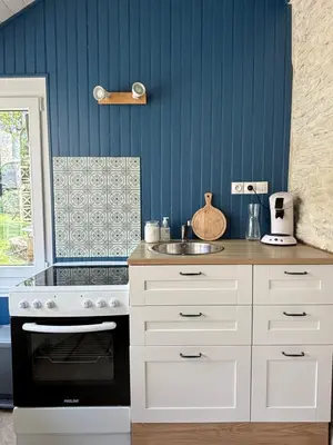 Cuisine ou kitchenette dans l'établissement Studio Confort Bourg de Mer sur Gold Beach