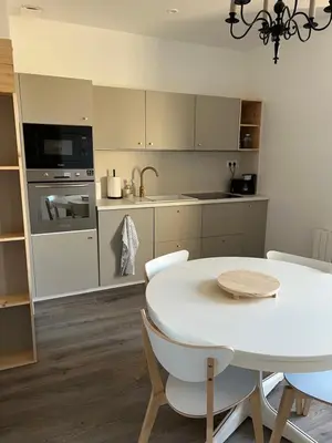 Cuisine ou kitchenette dans l'établissement Escapade en Baiocensis