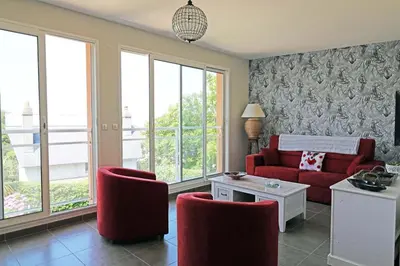Coin salon dans l'établissement Appartement les hirondelles