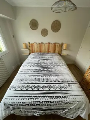 Un ou plusieurs lits dans un hébergement de l'établissement Appartement à 100m de la plage