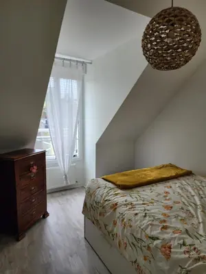 Un ou plusieurs lits dans un hébergement de l'établissement bel appartement 4 personnes