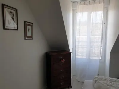 Un ou plusieurs lits dans un hébergement de l'établissement bel appartement 4 personnes