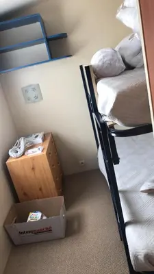 Un ou plusieurs lits dans un hébergement de l'établissement Mobil Home