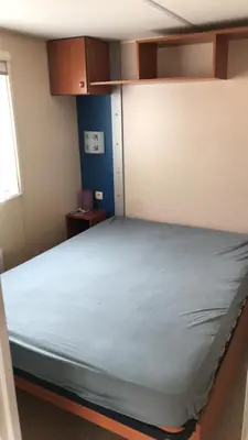 Un ou plusieurs lits dans un hébergement de l'établissement Mobil Home