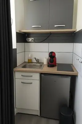 Cuisine ou kitchenette dans l'établissement Studette Sable & Mer cosy à 100m de la plage