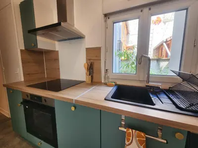 Cuisine ou kitchenette dans l'établissement Le Cocon du Château - Appt 4pers - Hypercentre