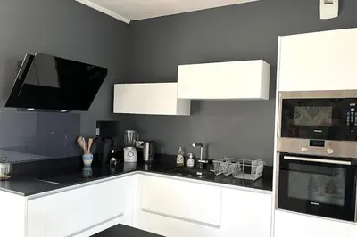 Cuisine ou kitchenette dans l'établissement Azalée