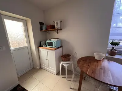 Cuisine ou kitchenette dans l'établissement Namthalé - maisonnette cosy proche mer