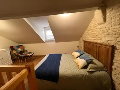 Un ou plusieurs lits dans un hébergement de l'établissement Namthalé - maisonnette cosy proche mer