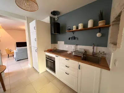 Cuisine ou kitchenette dans l'établissement Namthalé - maisonnette cosy proche mer