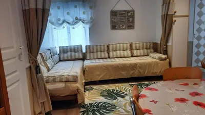 Un ou plusieurs lits dans un hébergement de l'établissement Maison charmante à Saint-Martin-des-Entrées
