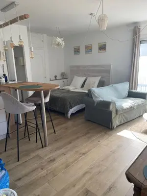 Coin salon dans l'établissement Grand Studio Balnéaire