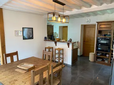 Cuisine ou kitchenette dans l'établissement Le Jardin Poulard