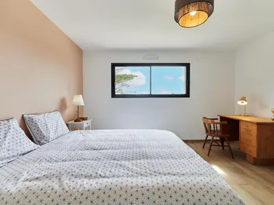 Un ou plusieurs lits dans un hébergement de l'établissement Holiday Home Les lilas by Interhome